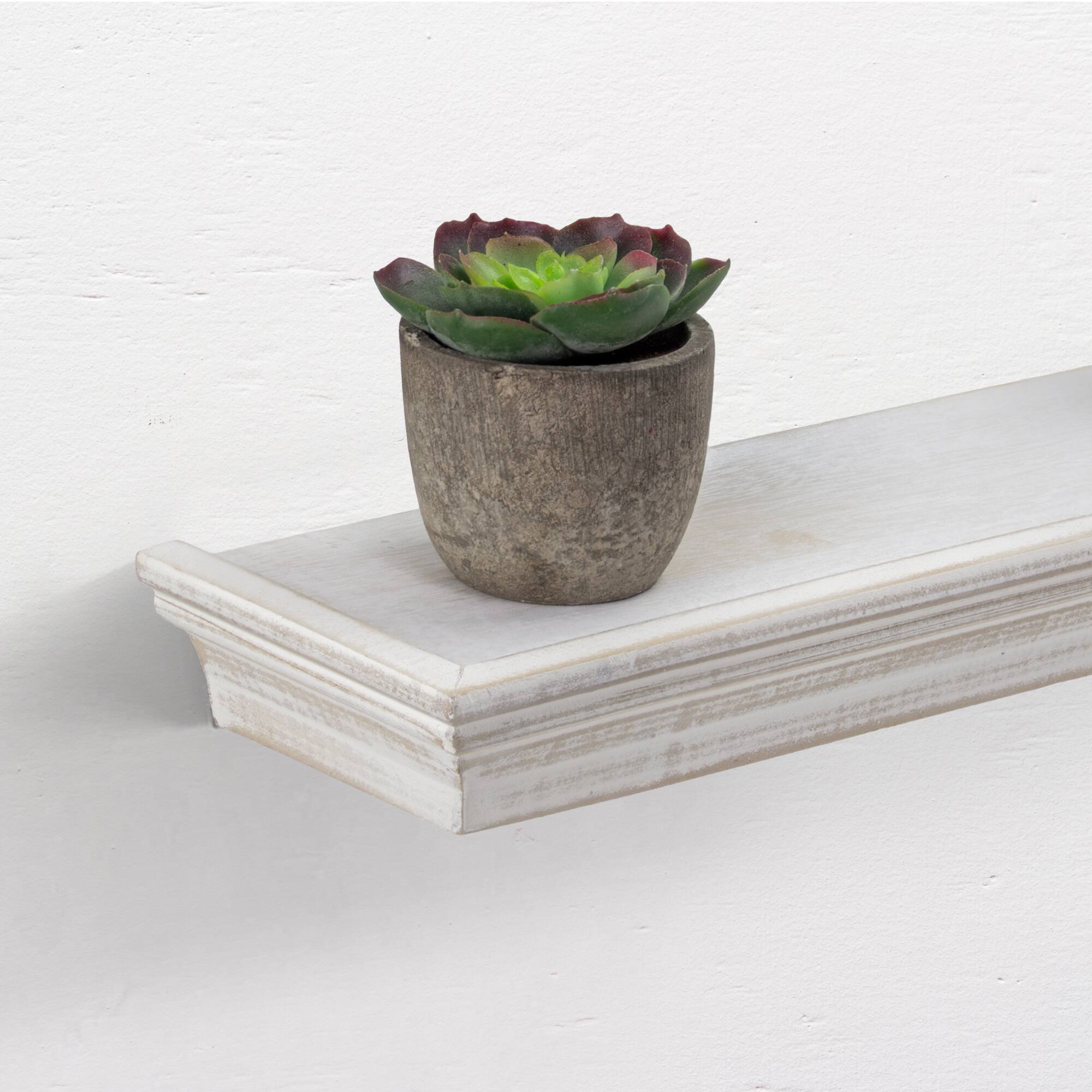 White Floating Shelves with Crown Molding